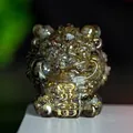 Q-version lucky beast figurine made of resin with embedded dark crystals and gold fu character - Labradorite