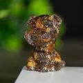 Schnauzer-Figur aus Tigerauge-Harz mit süßer Schleife in sitzender Pose Dekoration - Tigerauge