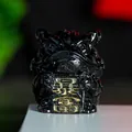 Glossy black resin Three-Legged Toad figurine holding a gold plaque with Bao Fu text - Obsidian