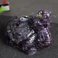 Détail de la tortue dragon en cristal violet avec symbole Yin Yang et pièces gravées - Améthyste