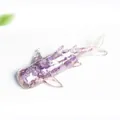 Artistic whale shark sculpture crafted in clear resin with purple amethyst stone inlay - Dreamy Purple