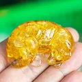 Sleeping cat resin figurine with amber crystal stones in compact handheld size - Citrine