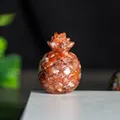 Reddish-brown resin pineapple ornament with natural crystal texture and leaf carving - Red Agate