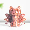 Handmade Nine-Tailed Fox resin figurine with red crystal stone inlay on white background - Red Jasper