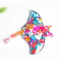 Artistic resin manta ray sculpture filled with colorful crushed crystal stones - Colorful Shell