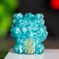 Blue resin crystal lucky lion figurine with gold Baofu inscription for wealth - Aquamarine