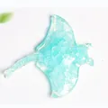 Light blue manta ray resin figurine filled with natural crystal stones for decor - Aquamarine