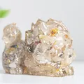 Translucent yellow resin Dragon Turtle statue with internal golden crystal decoration - Rutilated Quartz