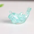 Light blue resin narwhal figurine filled with natural crystal stones for desk decor - Aquamarine