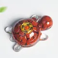 Resin turtle sculpture with red agate stones and a golden coin for home decor - Red Jasper