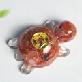Resin turtle sculpture with natural red agate stones and a golden Chinese coin on top - Red Agate