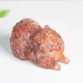 Handcrafted red rutilated quartz Pomeranian dog figurine with detailed hair texture - Red Agate