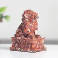 Traditional red crystal stone lion sculpture with natural jasper mosaic textures - Red Jasper