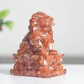 Traditional red crystal resin lion statue sculpture with decorative carved base pedestal - Red Agate