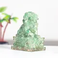 Translucent green resin lion sculpture on carved pedestal for home and office decor - Green Aventurine
