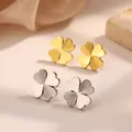 Detail of four-leaf clover earrings in gold and silver with radial brushed texture - Textured Clover Stud Earrings / Silver
