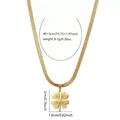 Gold clover necklace with snake chain and radial pattern measuring forty plus five cm - Clover Necklace / Gold