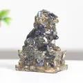 Labradorite guardian lion sculpture with blue iridescent flash and carved details - Black Labradorite