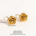 Detail view of 3D rose flower earrings in gold-plated stainless steel showing 0.31 inch size - Flower Stud Earrings / Gold