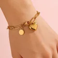 Polished 18k gold heart pendant bracelet with asymmetrical paperclip chain detail - Heart Bracelet (FSY754)