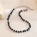 Bohemian black beaded bracelet with multifaceted cut beads and silver extension chain - Bracelet / Steel