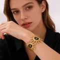 Vintage gold-plated sun-burst open cuff bracelet with black enamel swirl motifs for women - Black