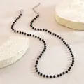 Bohemian black beaded necklace with silver-tone adjustable clasp and multifaceted stones - Necklace / Steel