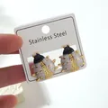 Polished stainless steel ladybug earrings with white marble texture and gold accents - Ladybug Earrings (FYD6161EH)