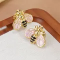 Chic 304 stainless steel bee stud earrings with pink enamel wings and golden finish - Pink