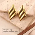 Polished stainless steel gold earrings with flame design, 3.57cm size and 7.77g weight details - Curved Streamline Style (FY6051) / Gold