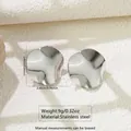 Detail view of irregular wave-textured silver stainless steel earrings with size specs - Wavy Round (FYD6162-1)