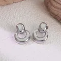Polished silver titanium steel geometric earrings on minimalist textured background - Heavy Geometric (FYD6137-1)