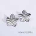 Detailed close-up of silver steel flower earrings showing weight 11g and petal texture - Radial Petal (HQ6002-1)