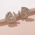 Detail of silver croissant dome earrings with bold twisted texture on a minimalist podium - Croissant Texture (FYD6154-1)