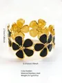 Bracciale rigido in acciaio inossidabile dorato con fiori in smalto nero e misure - Nero