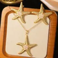 Parure bijoux étoile de mer dorée avec perles blanches incluant collier et boucles - Style d'Étoile de Mer avec Perle d'Imitation Incrustée (FYD6038EH+FYD6038XL)
