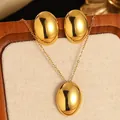 Parure bijoux minimaliste dorée avec clous ovales et collier fin sur support en tissu - Style Ovale Plein Brillant Simple (FYD6096XL+FYD6096)