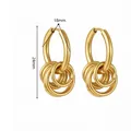 Detailed view of layered gold hoop earrings with 24mm height and polished finish - 18mm x 24mm / Gold