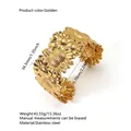Bracciale rigido aperto in acciaio inossidabile dorato con motivo a girasole - JH017 / Oro