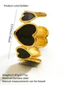 Bracciale rigido a cuore in acciaio dorato con dettagli in smalto nero e design aperto - Nero