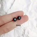 Pendientes de botón de 6mm en acero inoxidable con circonita negra redonda - Tamaño Mediano / Negro