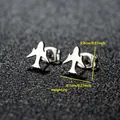 Vista macro de pendientes de acero inoxidable con forma de avión con medidas y peso - Avión