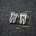 Detailed view of silver tooth-shaped studs with precise dimensions and weight specs - Tooth