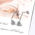 Detailed view of silver heart pendant earrings with chain and spherical screw back design - White Crystal Heart Tassel (Pair) / Steel