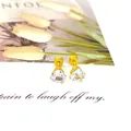 Vue détaillée de boucles d'oreilles cœur en acier titane doré avec zircon et tulipes - 6mm Or Zircone Cœur Dos Plat Vissé