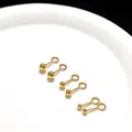 Primer plano de tres pares de pendientes de bola de acero de titanio dorado en plato - 3mm Dorado Forma de Ojal