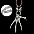 Gothic punk necklace featuring a silver skull claw pendant with brown leather cord - Hamsa Hand
