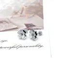 Elegant frosted clover earrings in silver and black finish with secure screw back closure - Frosted Clover / Steel