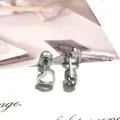Detalle de pendientes de corazón en acero inoxidable con cierre de rosca y pequeño diamante - Rhinestone de corazón hueco (Individual)