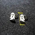 Polished stainless steel ghost stud earrings showing 9mm height and 6mm width dimensions - Ghost / Steel